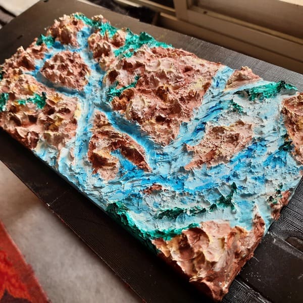Abstract blue textured artwork with rough surface details