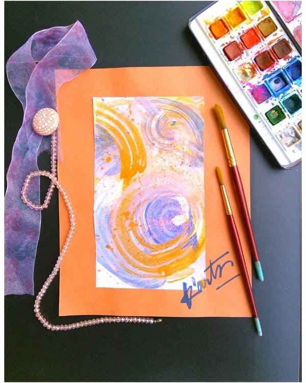 Abstract swirl painting with blue and orange tones