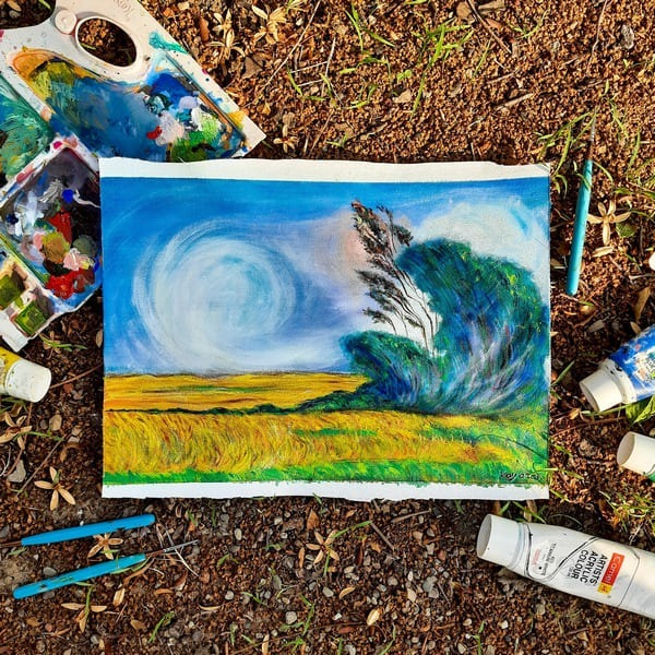 Blue ocean wave painting with layered textures and flowing movement