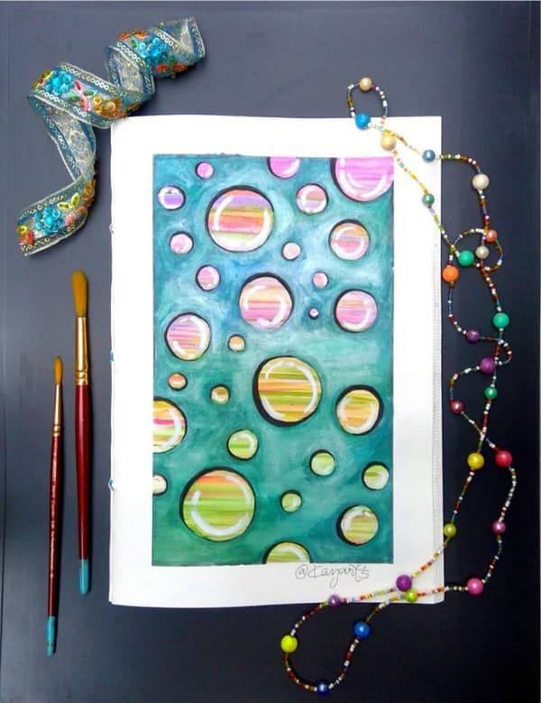 watercolor artwork with colorful circular patterns