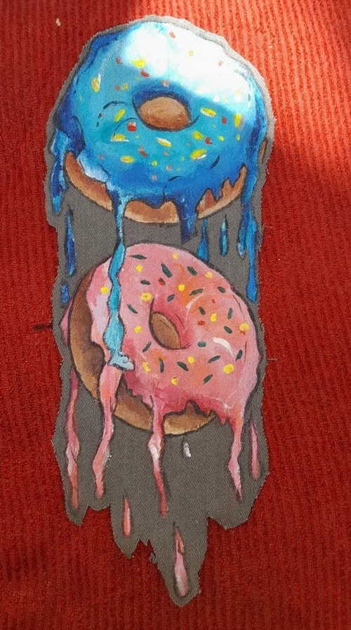 melting donuts hand painted on a clothing shirt
