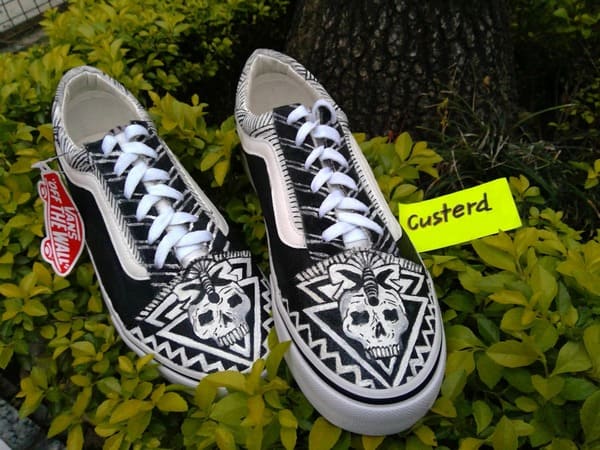 Vans black and white skull pattern custom sneakers front view