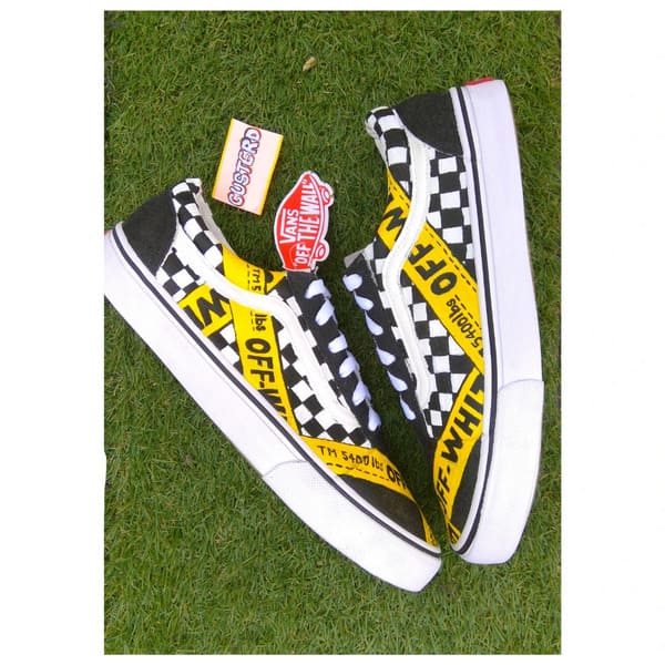 Vans off white custom sneakers yellow tape pair top view
